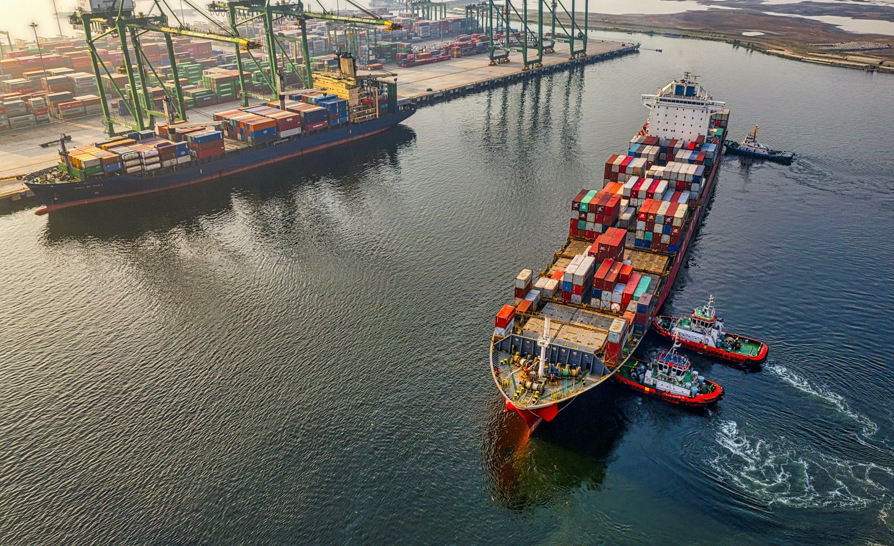 A container ship under way in a shipping channel